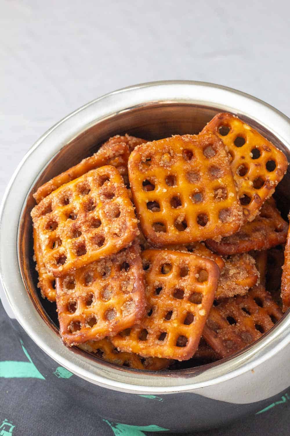 cinnamon sugar pretzels in a silver bowl