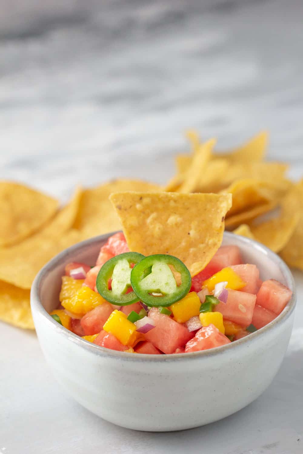fruit salsa in a bowl with chips