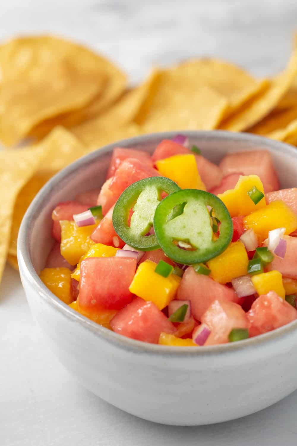 bowl of fruit salsa with chips
