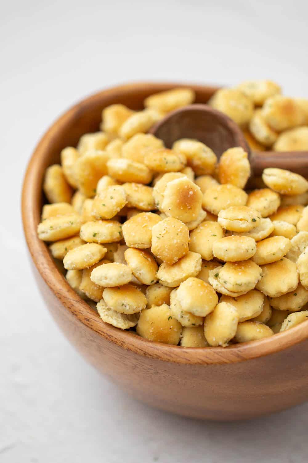 ranch oyster crackers in a wooden bowl