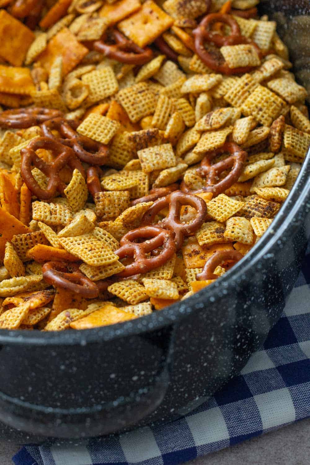 taco chex mix in baking dish
