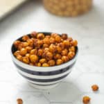 crispy baked chickpeas in a striped bowl