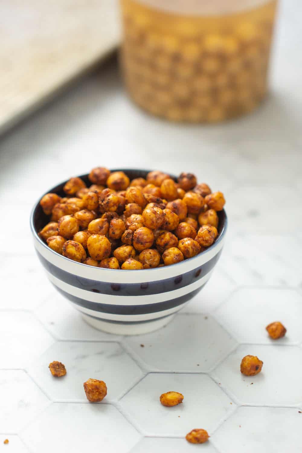 crispy baked chickpeas in a striped bowl