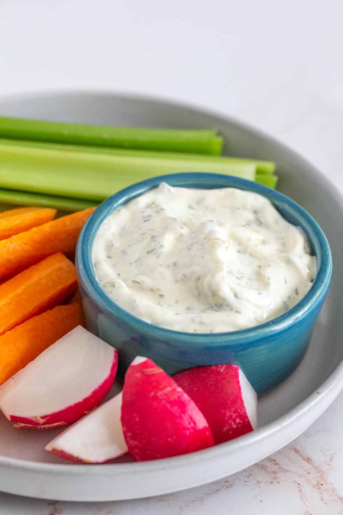 bowl of dill dip with vegetables