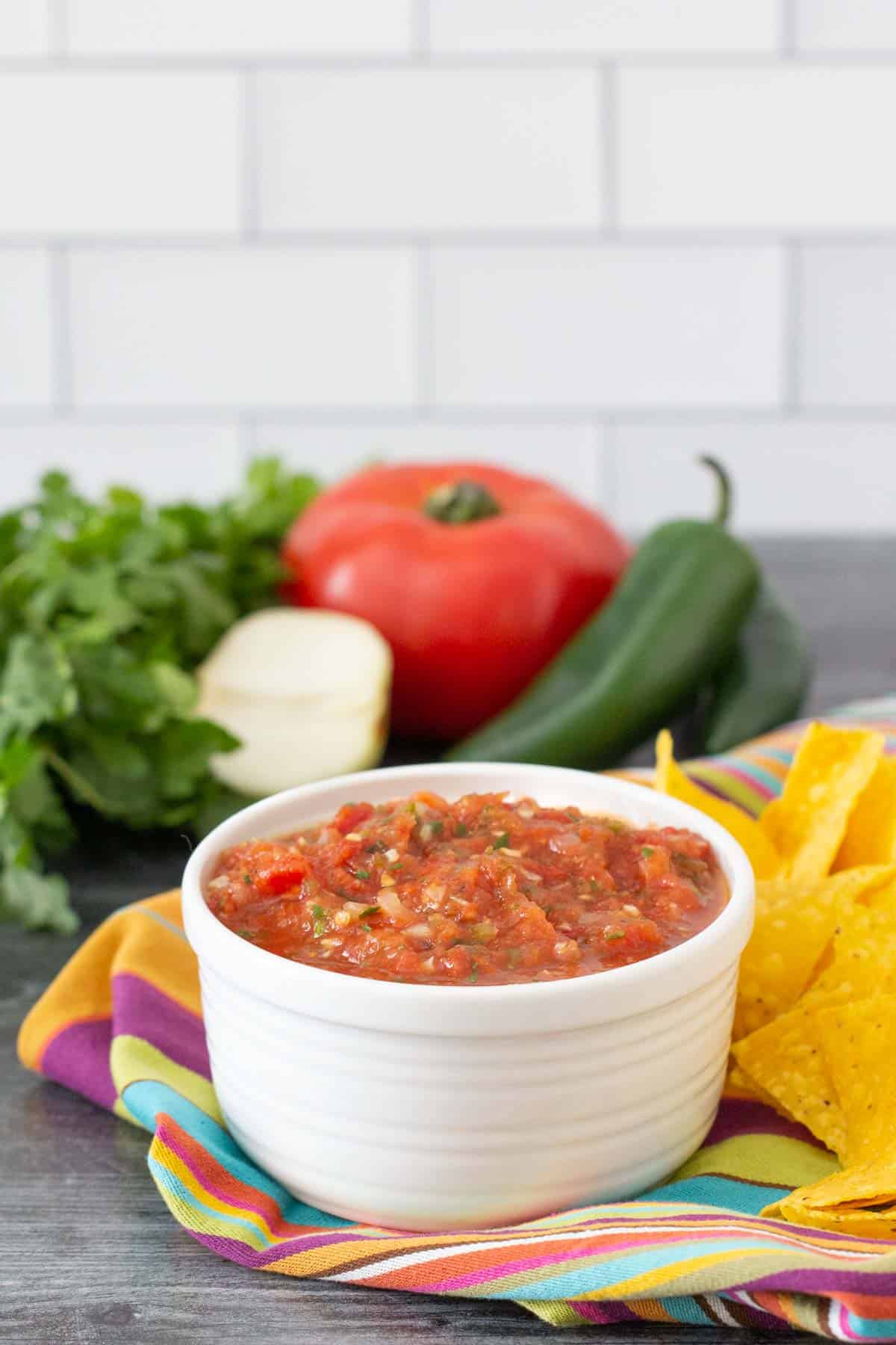 white bowl of roasted tomato salsa