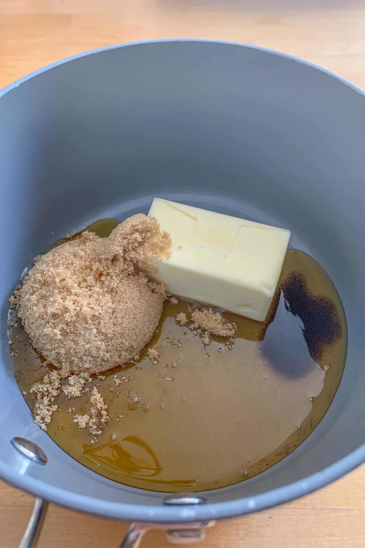 combining honey, brown sugar, and butter in saucepan
