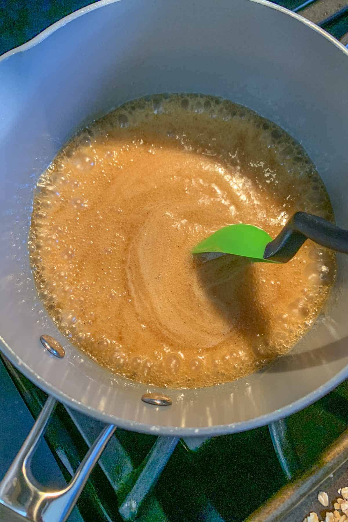 bubbling honey, brown sugar, and butter in saucepan