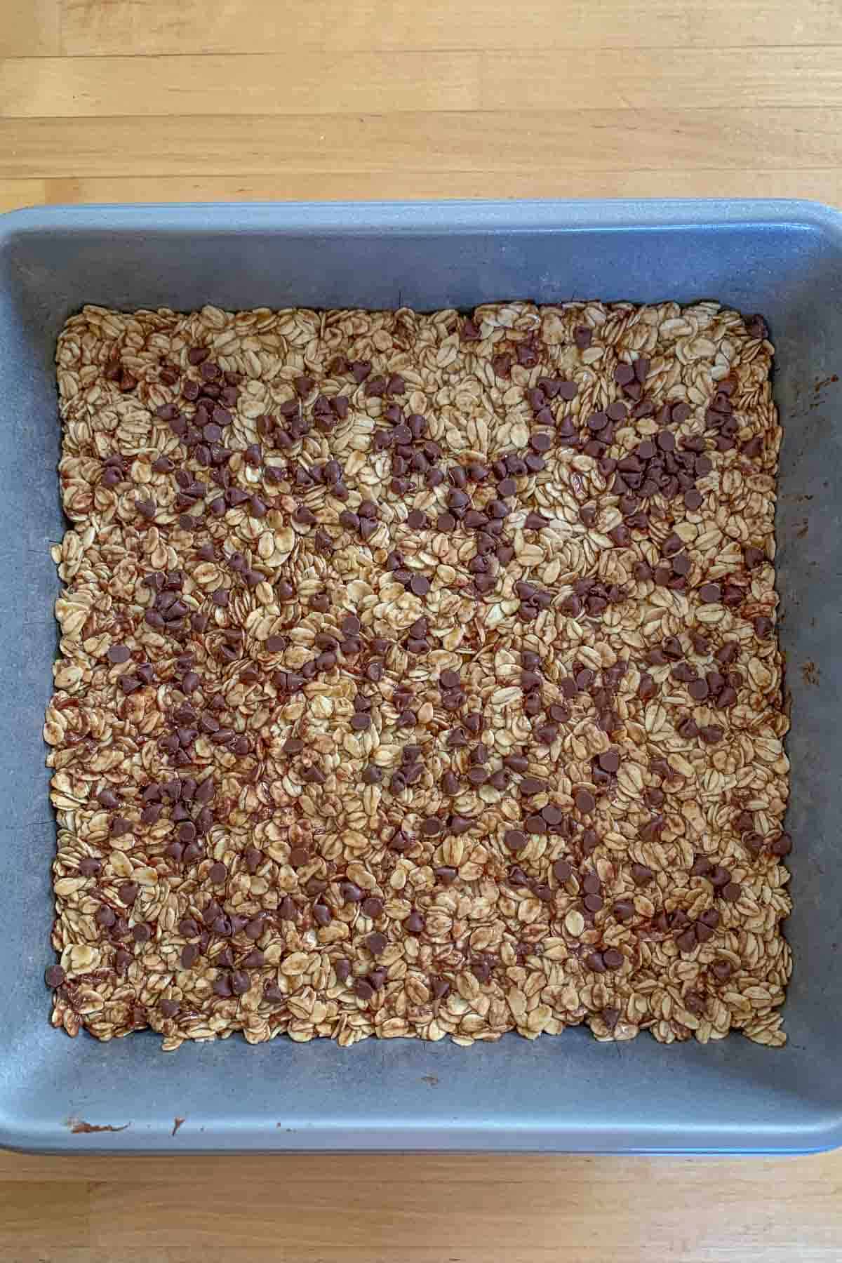 finished chocolate chip granola bars in pan