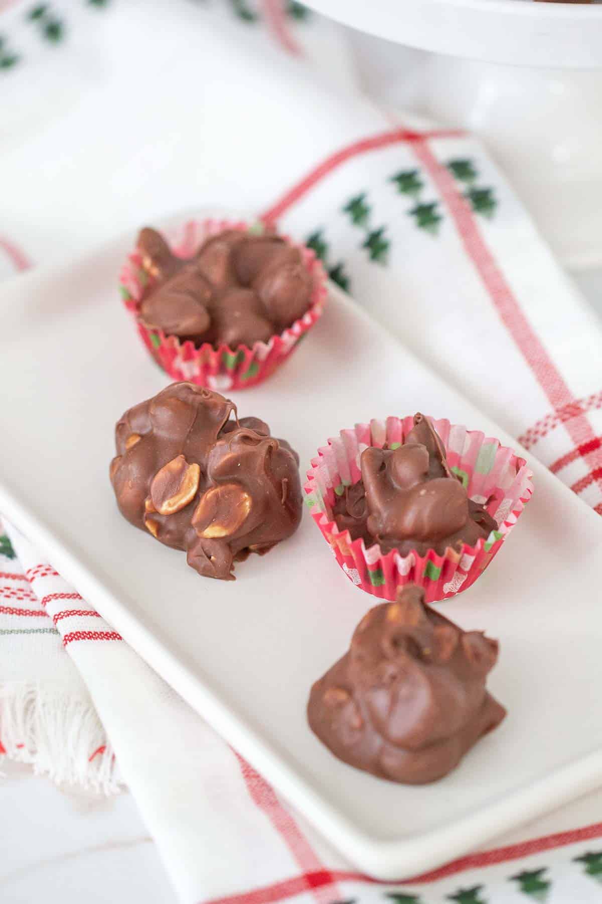 peanut clusters on a white tray