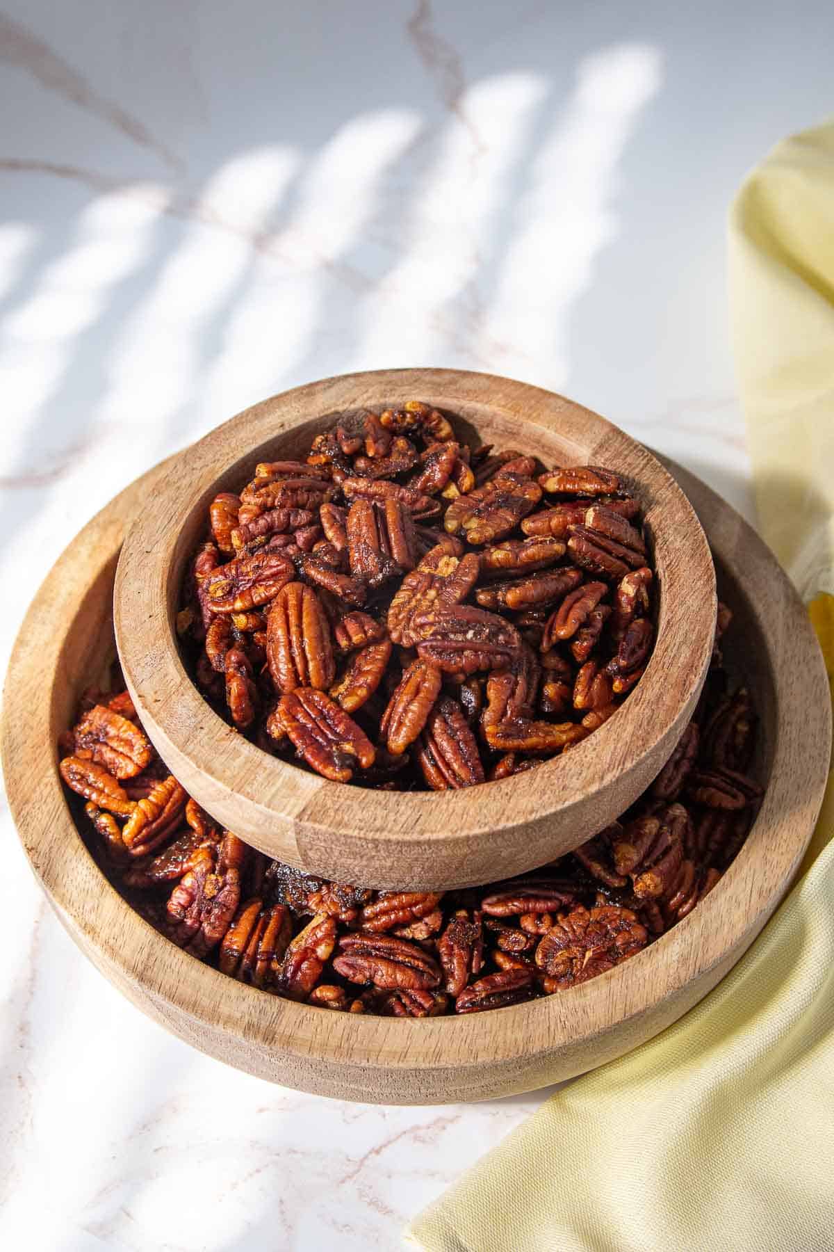spiced pecans in bowls
