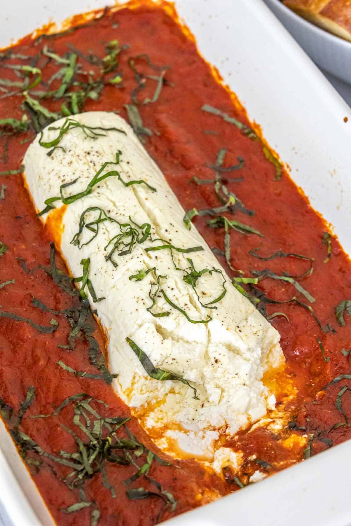 baked goat cheese with tomato sauce