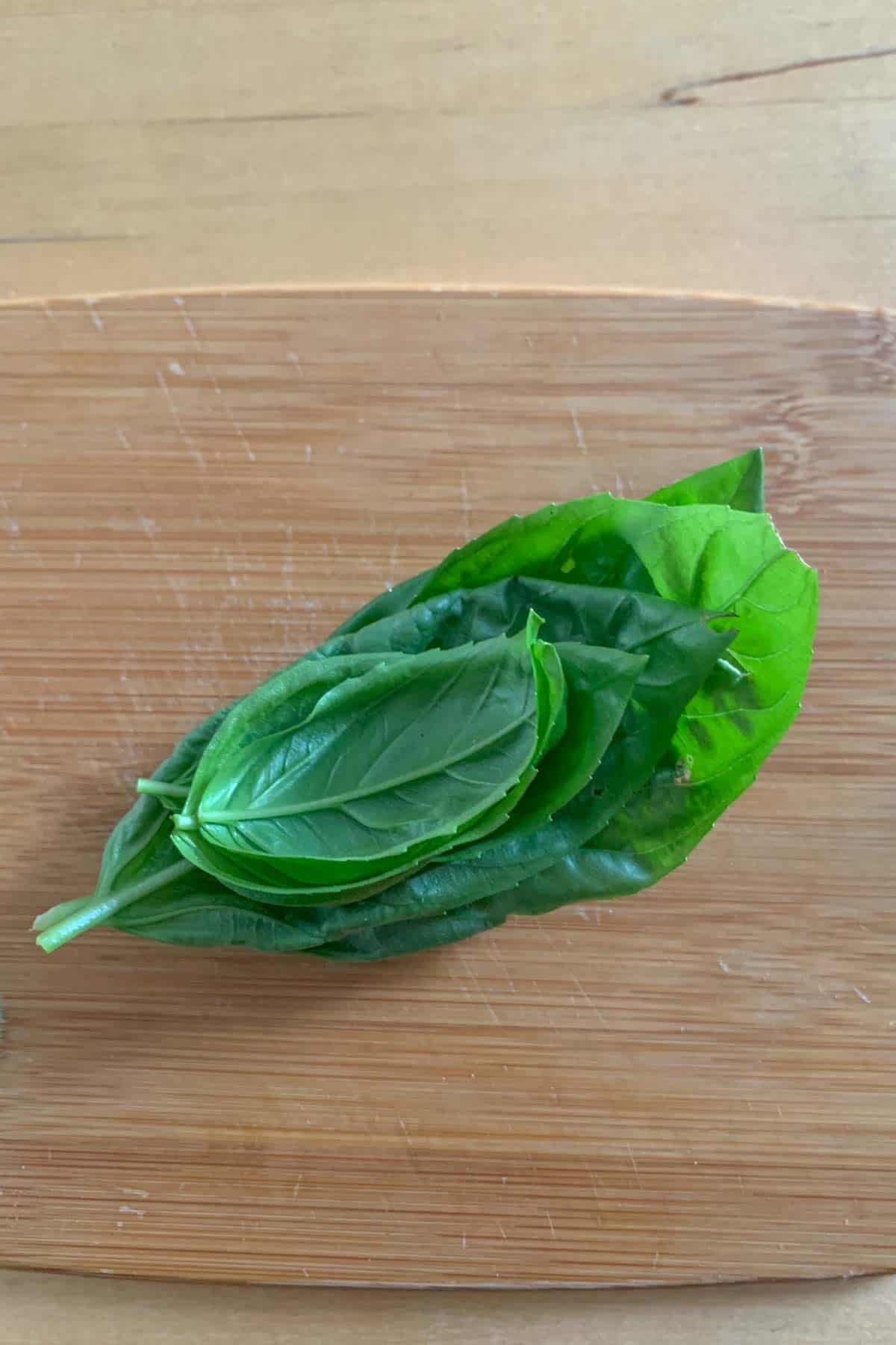 stacked basil leaves