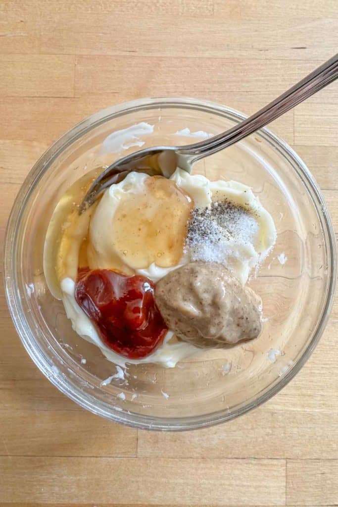 Ingredients for dipping sauce in a bowl before mixing together.