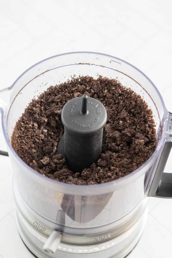 A food processor filled with cookie grounds.