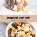 A bowl and jar of tropical trail mix with banana chips, almonds, chocolate chips, coconut flakes, and dried fruit, displayed on a white surface.