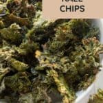 A white bowl filled with seasoned kale chips, with a label reading "Seasoned Kale Chips" and a website link at the bottom.