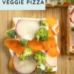 A slice of cold veggie pizza topped with broccoli, radish, and carrot on a wooden board, with text reading "Easy Appetizer: Cold Veggie Pizza.